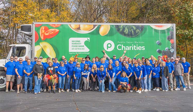 Team Members posing with a food charity