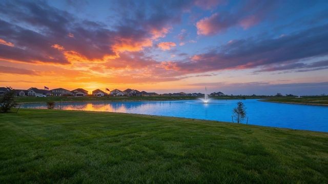 a photo of a body of water at sunset