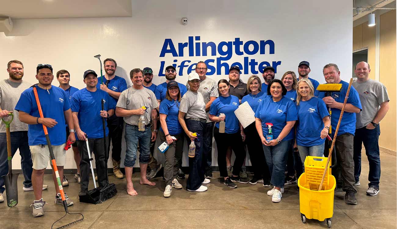 Dallas/Ft. Worth Team Members cleaned, power washed, landscaped and organized donations at Arlington Life Shelter.