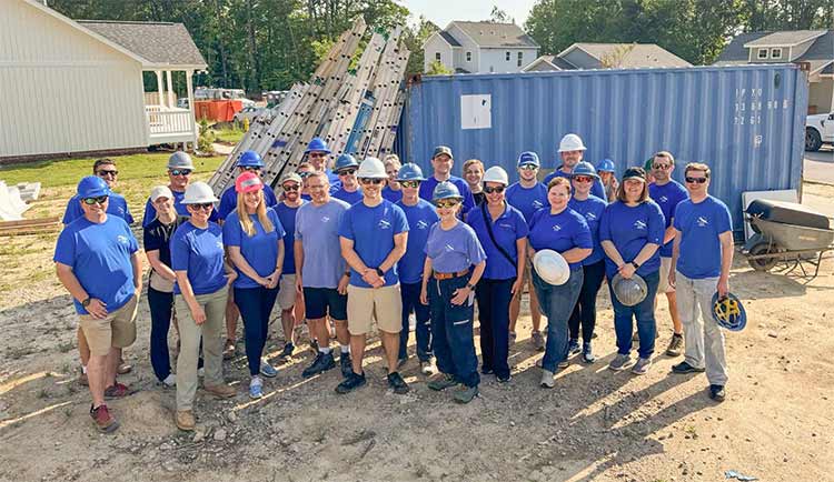 Raleigh Team Members partnered with Habitat for Humanity and worked on three homes for their Build Month project.
