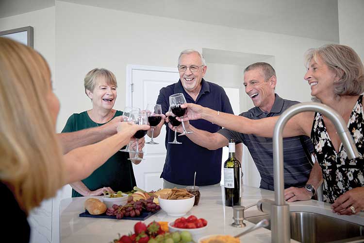 David Weekley Homes Encore Homeowners toasting with glasses of wine