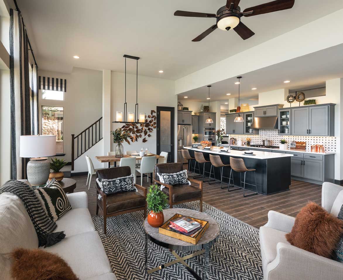 A David Weekley Home interior - living, dining and kitchen area