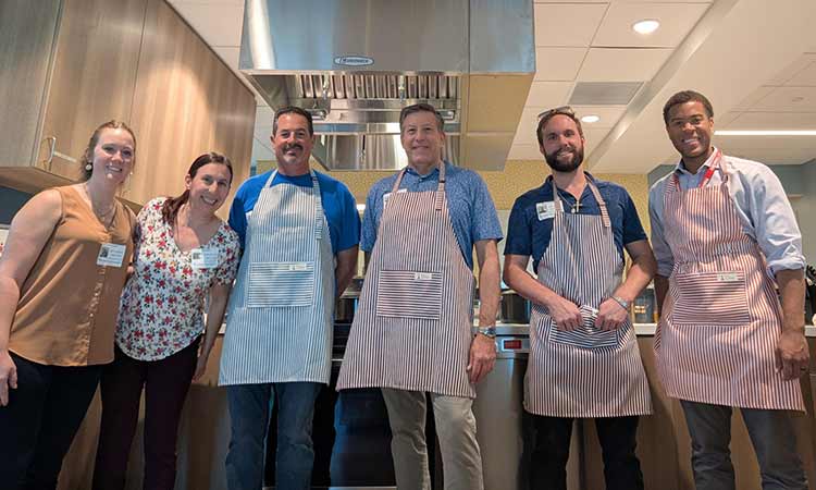 Members of the Tampa Land Team cooked and served a meal for families staying at the Ronald McDonald House Tampa Bay.